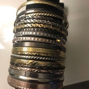 Gold and silver bangle bracelet set.